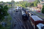 The rear of NS train K95 passes between Amtrak #171(14) and NS train 13R.